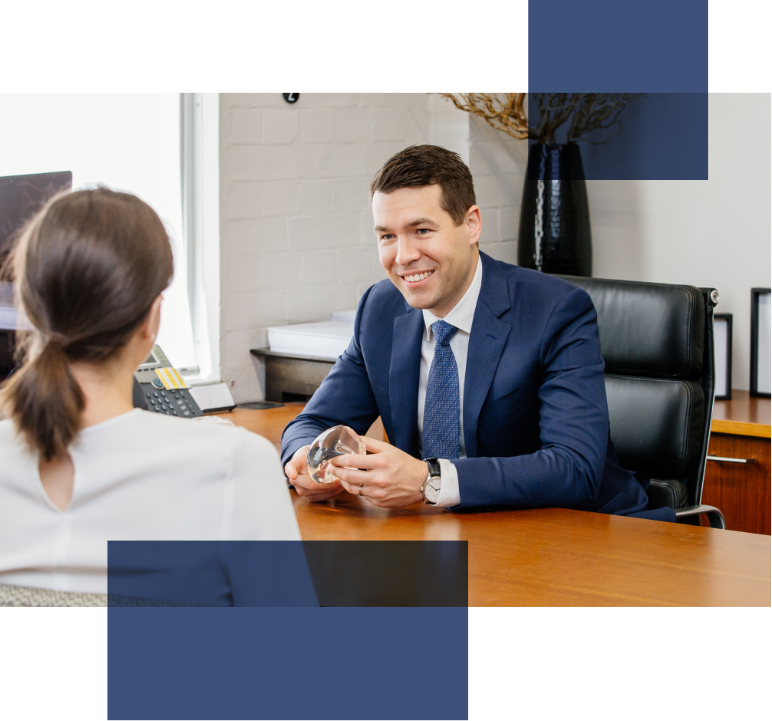 Consultation with Dr Peters 01 Dr Matthew Peters at consultation with a patient 01